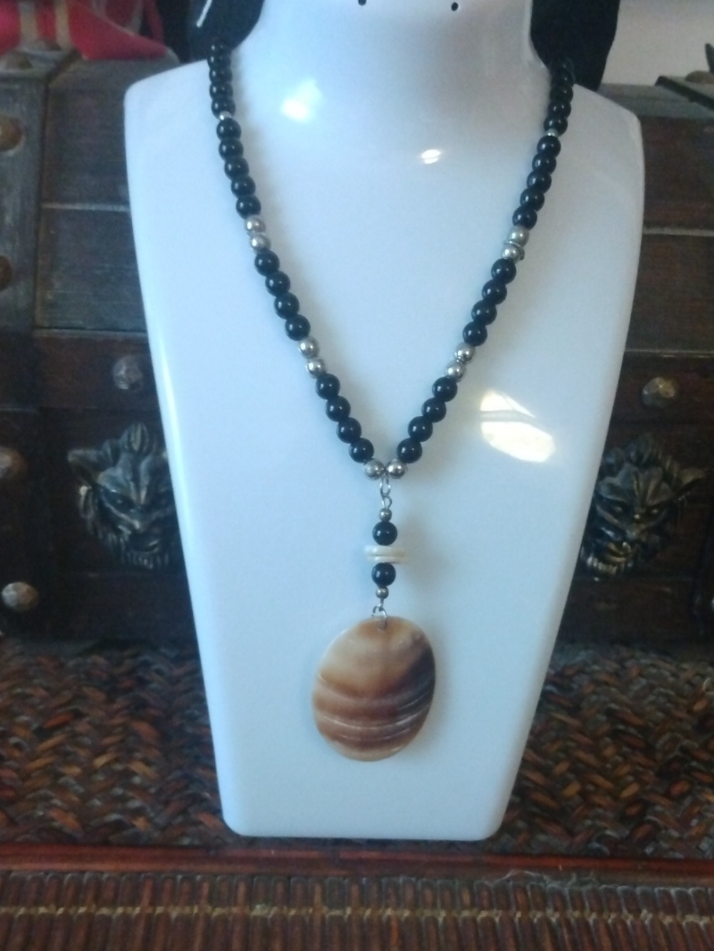 Black Beaded Necklace with Brown Shell Pendant
